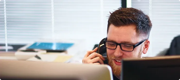 Burks pump expert providing phone support to a customer